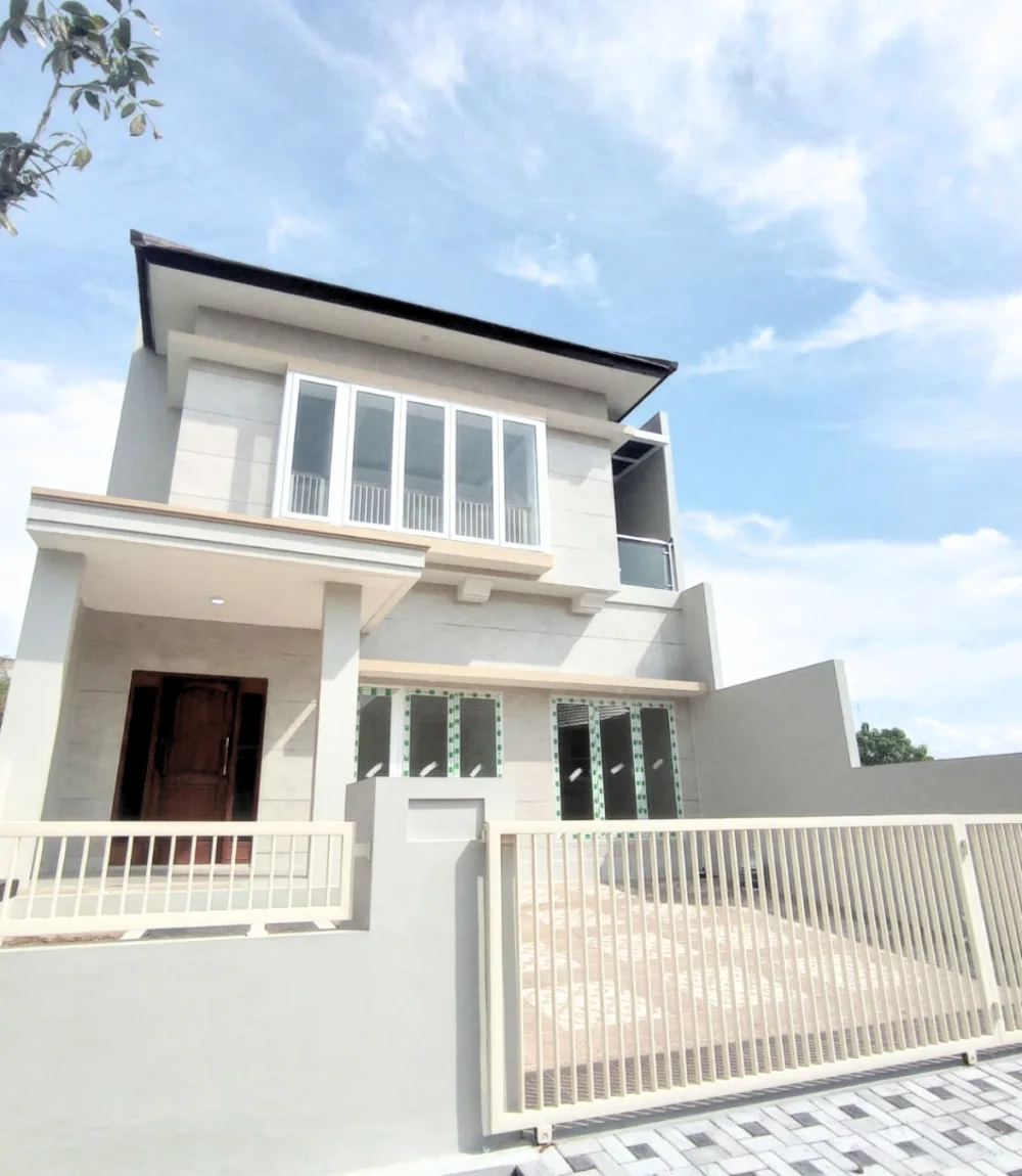 Two-storey house with white UPVC windows on both floors