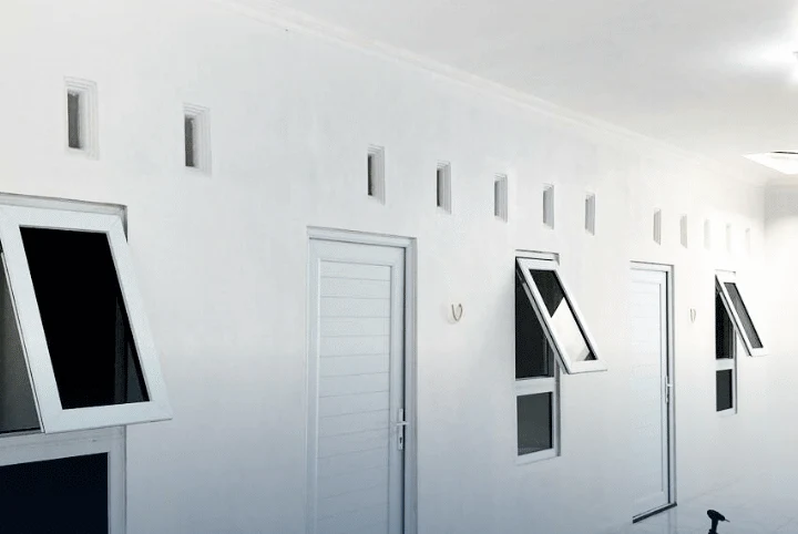 UPVC doors and windows installed: Boarding House — Full-Panel Swing Doors & Tilt Windows